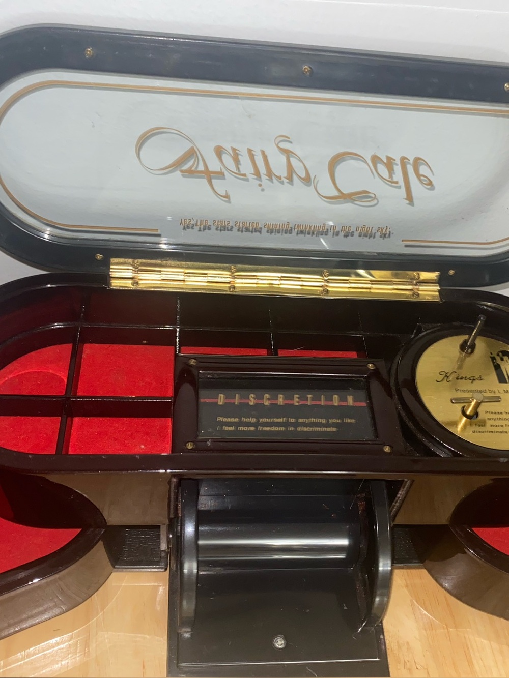 Vintage windup musical Discretion Jewelry Box with Red Velvet Interior